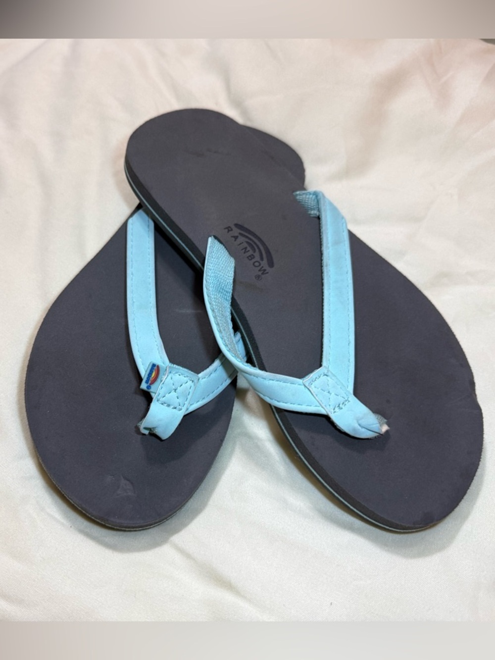Rainbow Light Blue Strap Flip Flops with Black Footbed